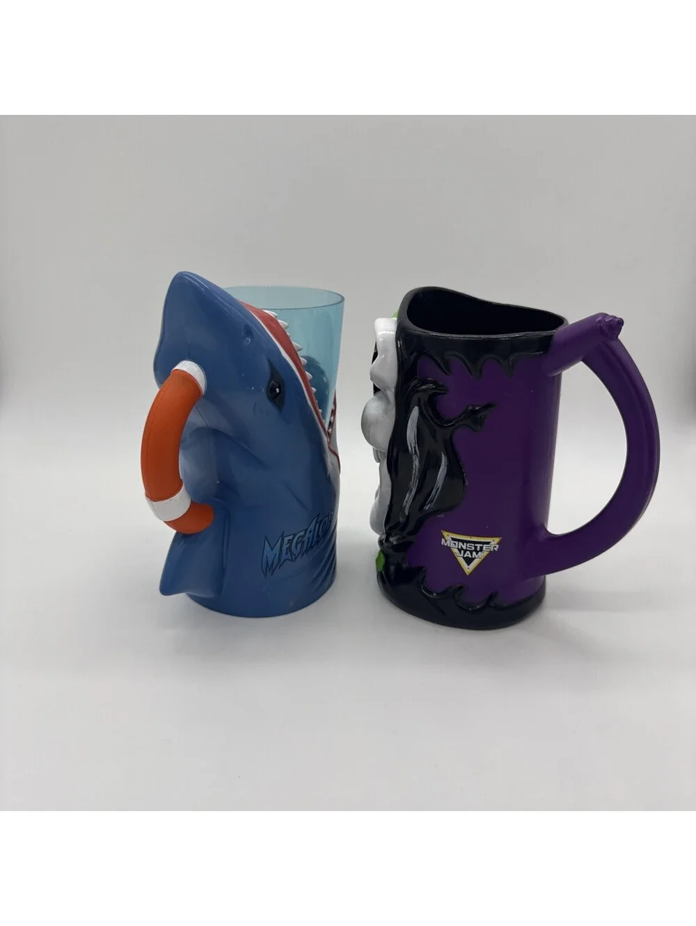 Monster Jam Megalodon Shark & Grave Digger Skull Light Up Cups They Do Not Work
